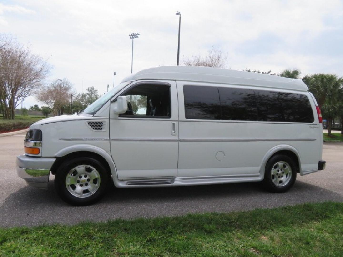 2010 White /Gray Chevrolet Express (1GNUGCD48A1) , located at 4301 Oak Circle #19, Boca Raton, FL, 33431, (954) 561-2499, 26.388861, -80.084038 - You are looking at a Gorgeous 2010 Chevy Express Handicap Wheelchair Conversion Van Explorer Limited SE with 31K Original Miles, Braun Century 750lb Side Entry Wheelchair lift, Tie Down System in the Floor, Rear Entertainment with Flat Screen TV/DVD, Leather Interior, Rear Power Folding Bench Seat/b - Photo#12